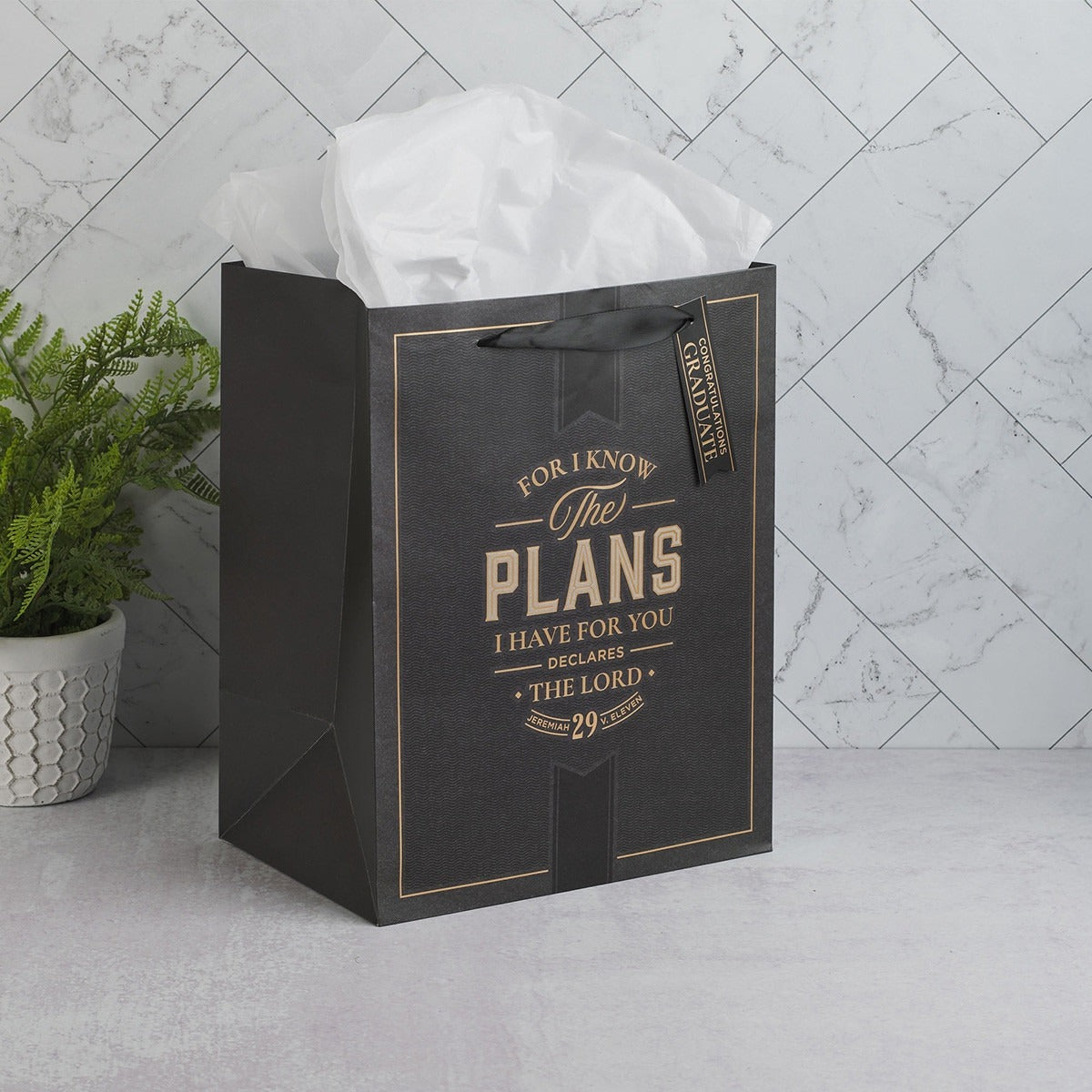 Large charcoal and gold portrait gift bag with Jeremiah 29:11 scripture and black ribbon handles, white tissue inside