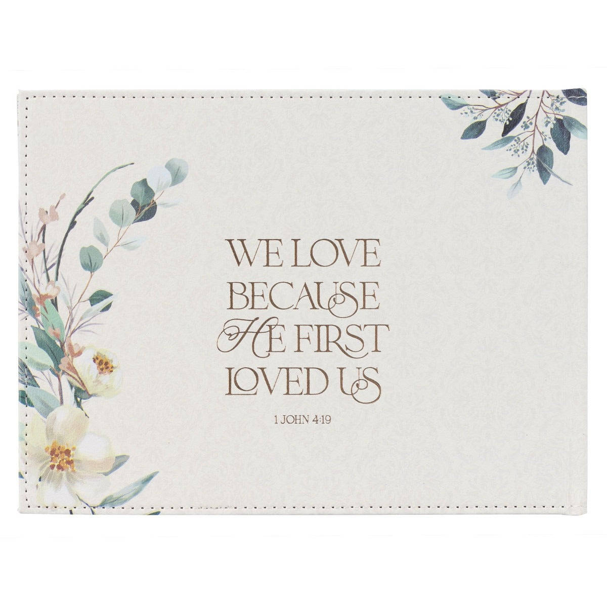 Mr. & Mrs. peachy-pink floral faux leather wedding guest book with 1 John 4:19 scripture and delicate leaf design