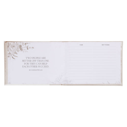 Open Mr. & Mrs. peachy-pink floral faux leather wedding guest book with Ecclesiastes 4:9 quote and lined signature page