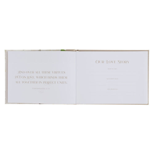 Love Ivory faux leather medium guest book open to pages with gold foil text and love story prompts