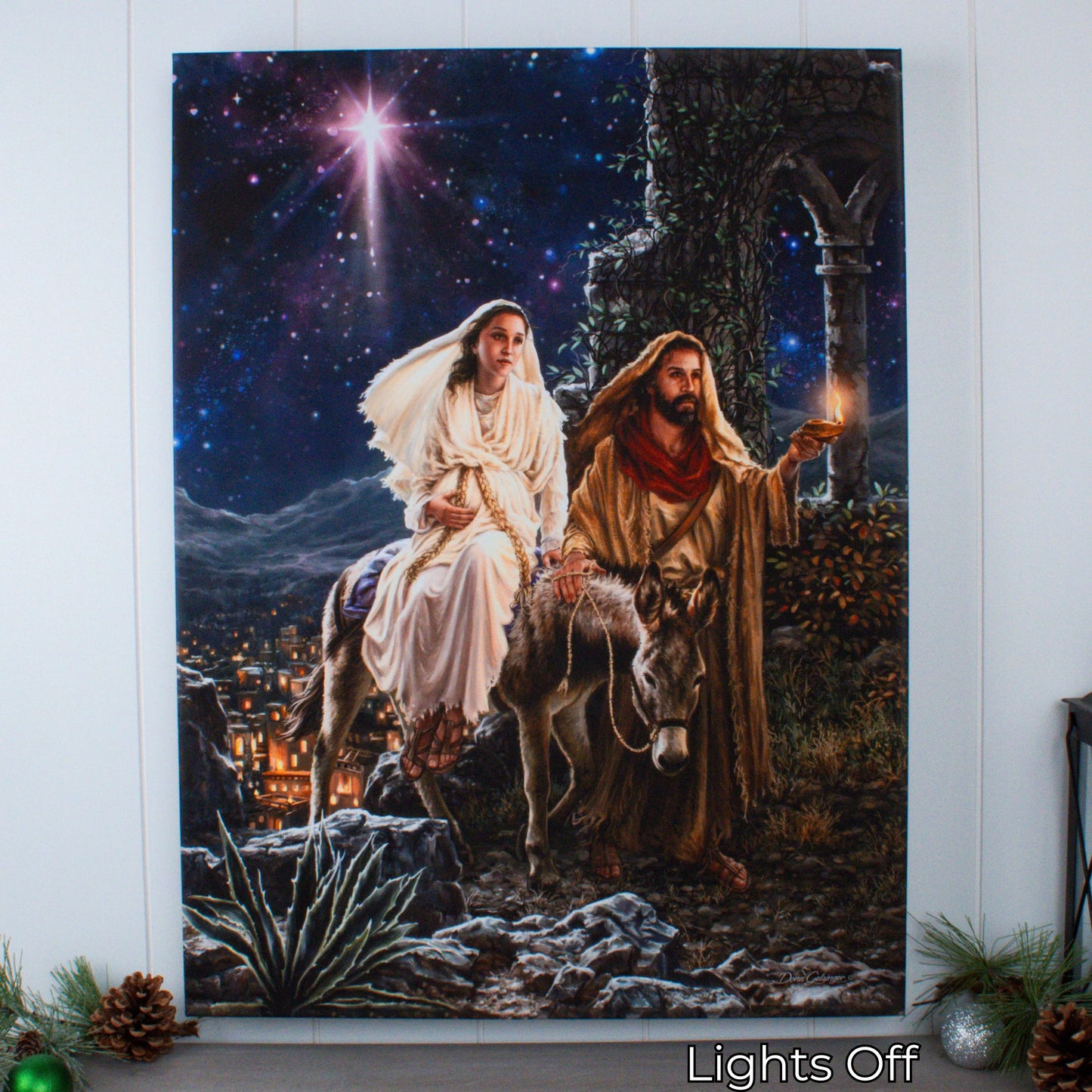 Illuminated canvas print of Mary and Joseph's journey to Bethlehem with bright star and night sky background