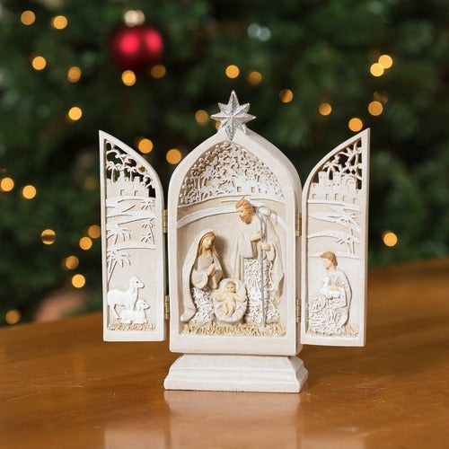 8.5" Holy Family paper cut nativity triptych in soft ivory with detailed openwork and star accent on top