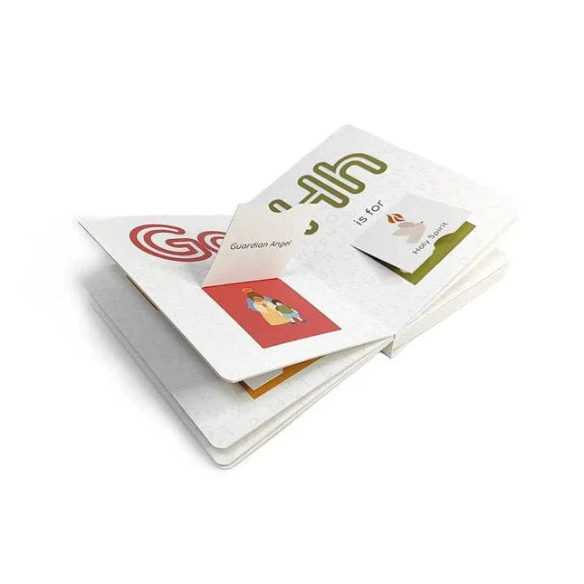 Open Catholic ABC board book showing letter G with Guardian Angel and letter H with Holy Spirit illustrations and text
