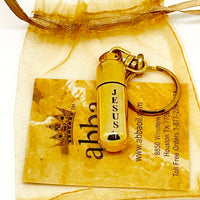 Hyssop in a Gold Tone "Jesus" Keychain and Holy Oil Holder - Unique Catholic Gifts