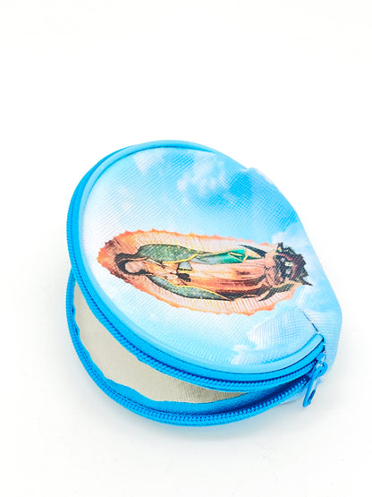 Large round rosary pouch with zipper closure featuring Our Lady of Guadalupe image on blue sky background
