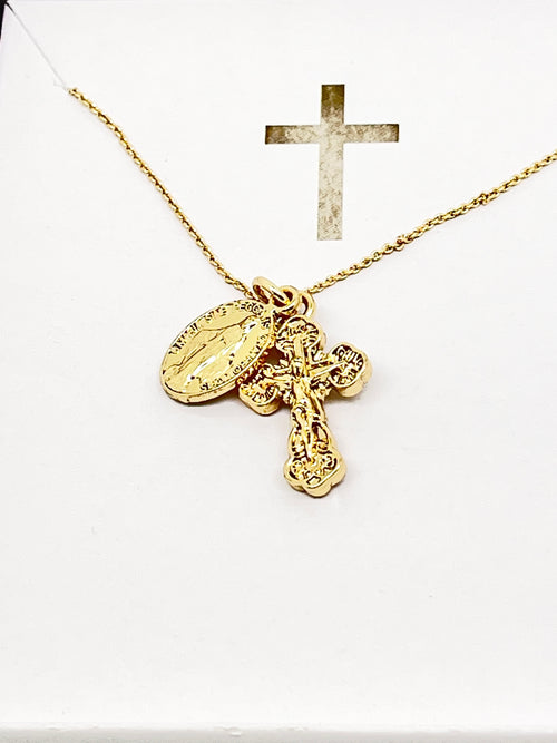 Gold Miraculous Medal and ornate crucifix necklace on delicate chain, 15 inches long, symbolizing faith and devotion.