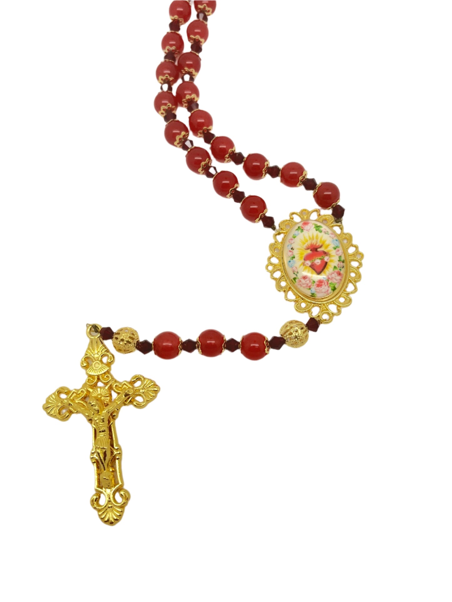 Immaculate Heart of Mary Rosary with deep red gold-capped glass beads, filigree gold Our Father beads, and detailed gold crucifix