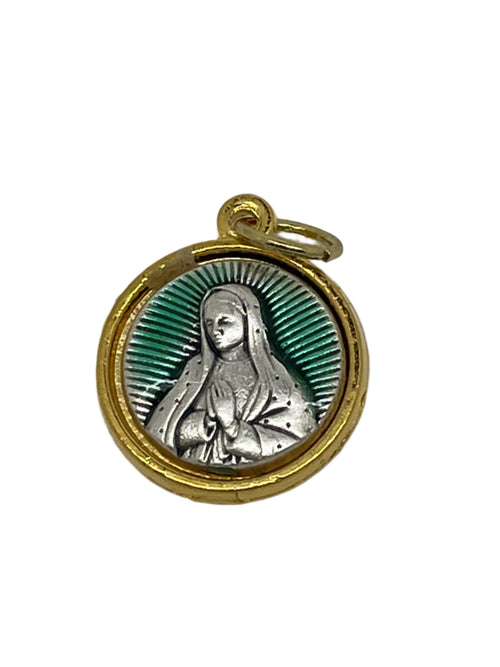 Small Our Lady of Guadalupe medal charm with silver figure, green enamel background, and gold-tone border ring