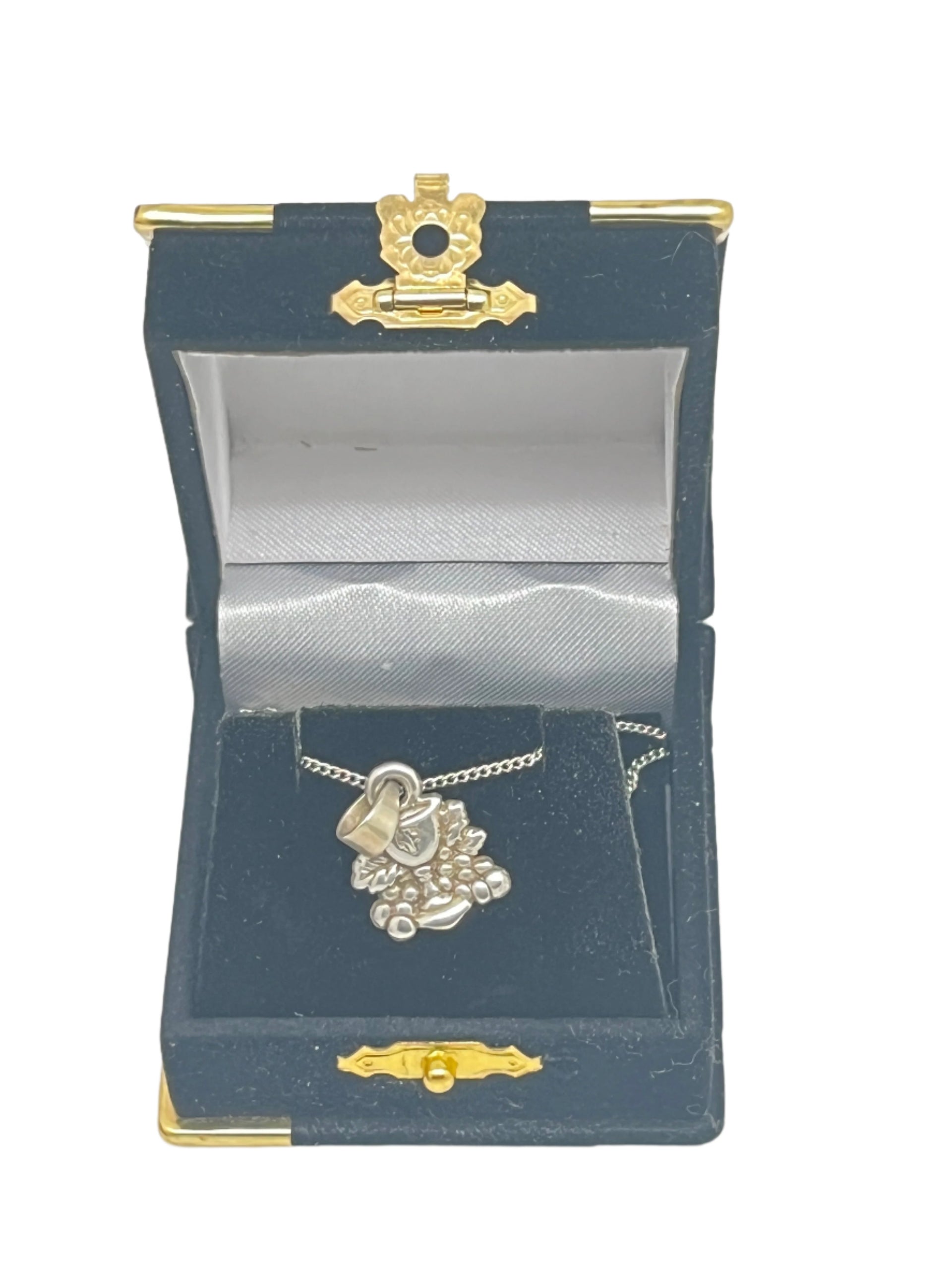 Handmade sterling silver Chalice First Communion pendant with detailed grape cluster design in black velvet gift box.
