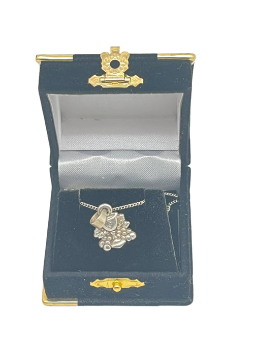 Handmade sterling silver Chalice First Communion pendant with detailed grape cluster design in black velvet gift box.