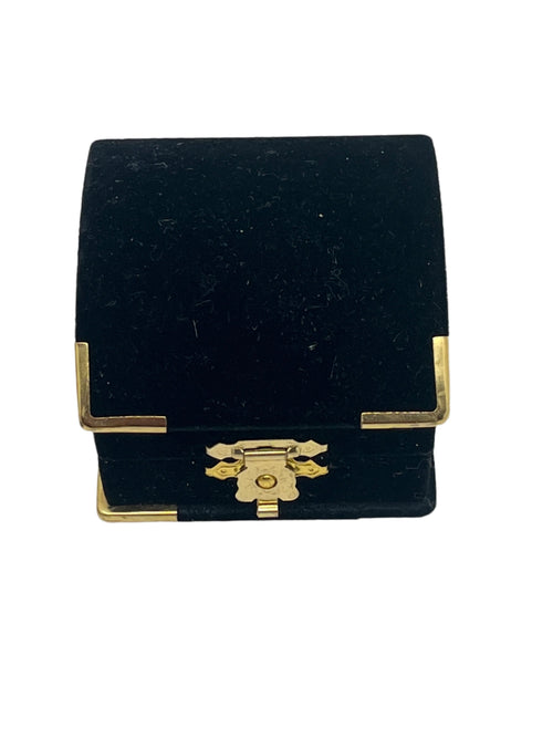 Black velvet jewelry box with gold-tone metal corners and decorative latch closure, perfect for pendants or small keepsakes.