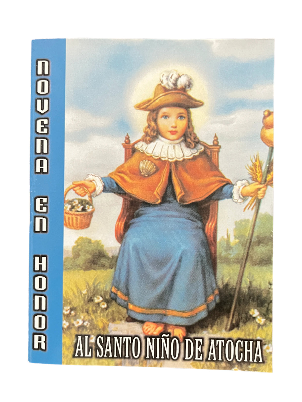 Prayer booklet titled Novena en honor al Santo Niño de Atocha with colorful religious illustration on cover