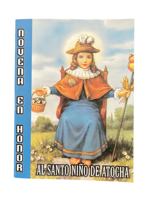 Prayer booklet titled Novena en honor al Santo Niño de Atocha with colorful religious illustration on cover