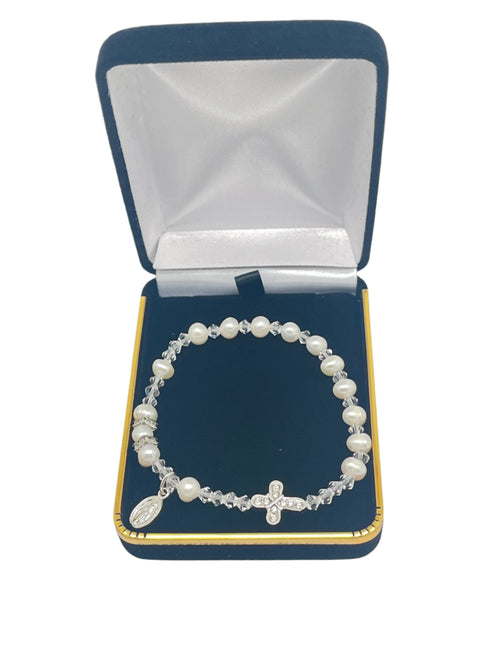 Genuine pearl rosary bracelet with Swarovski crystals and rhodium plated crucifix in blue velvet gift box.