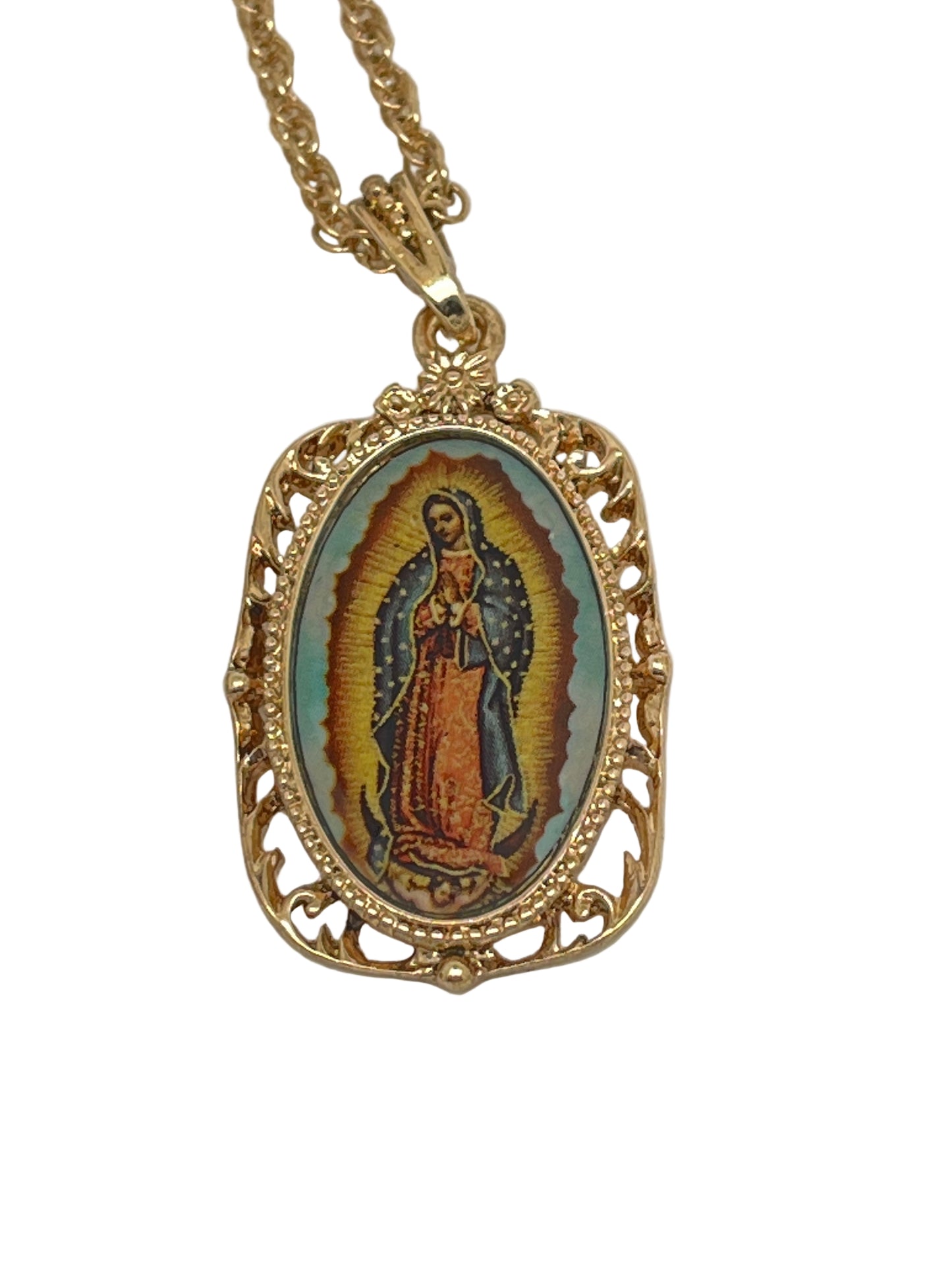 Gold Our Lady of Guadalupe medallion necklace with detailed filigree frame and colorful traditional image pendant