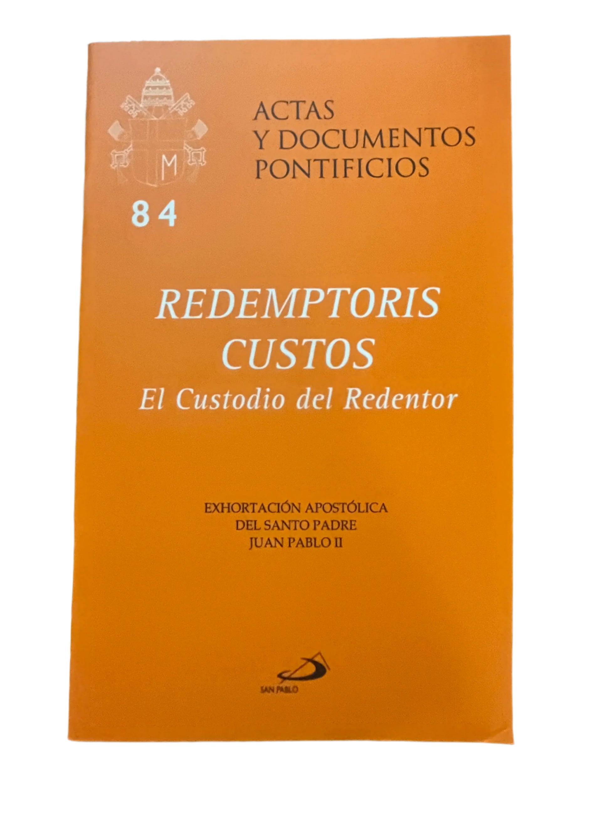 Redemptoris Custos book cover with orange background featuring apostolic exhortation by Pope John Paul II in Spanish text