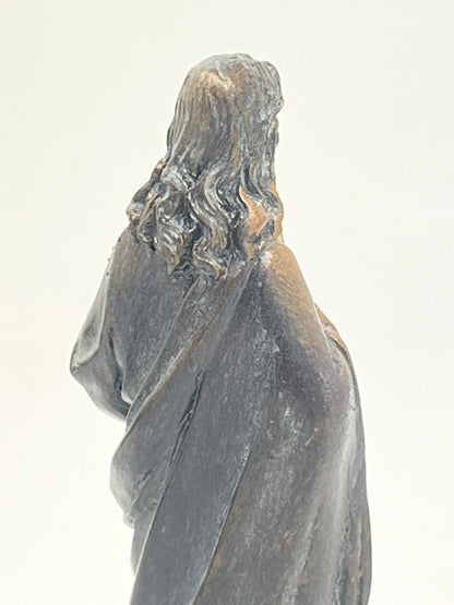 4-inch Sacred Heart of Jesus statue with bronze patina finish, showing detailed hair and robe from rear view