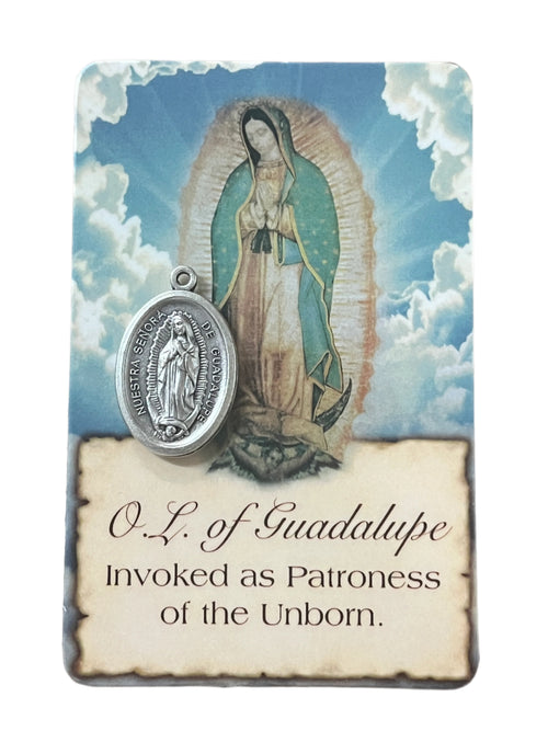 Our Lady of Guadalupe prayer card with attached silver-tone medal, showing traditional image and devotional text on blue cloud background