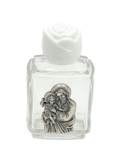 Small glass holy water bottle with pewter St. Joseph image and white rose cap, holding about one ounce of water
