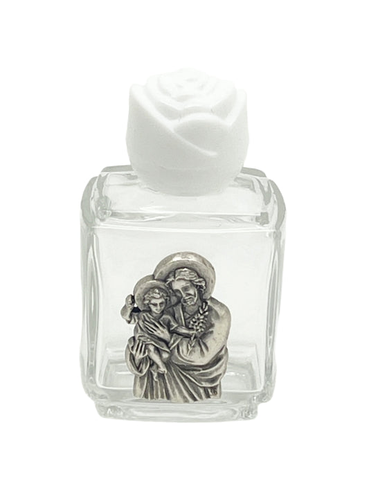 Small glass holy water bottle with pewter St. Joseph image and white rose cap, holding about one ounce of water