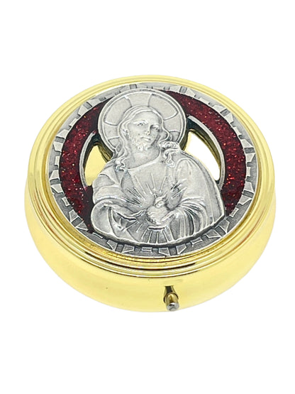 2 1/8" gold and pewter Sacred Heart pyx with red enamel accents and detailed religious figure on lid