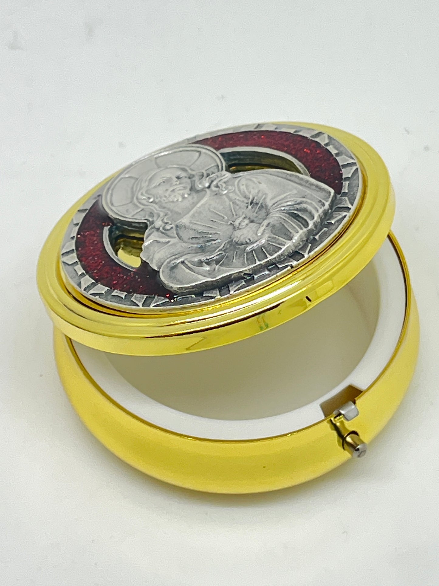 2 1/8" gold and pewter pyx with red enamel Sacred Heart design and white plastic lining for visitation use