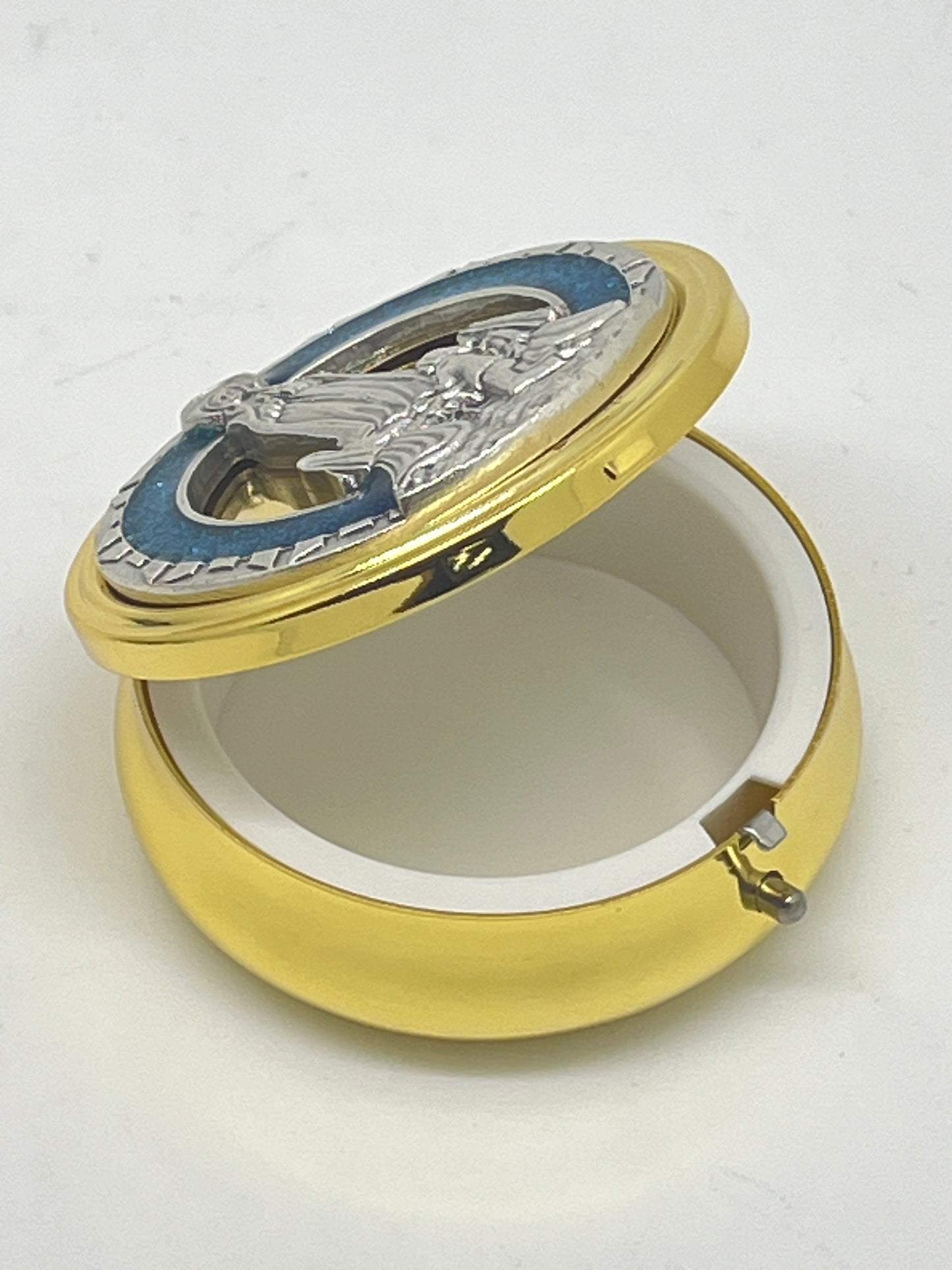 2 1/8" gold pewter pyx with blue enamel accents and raised Our Lady of Fatima design on hinged lid