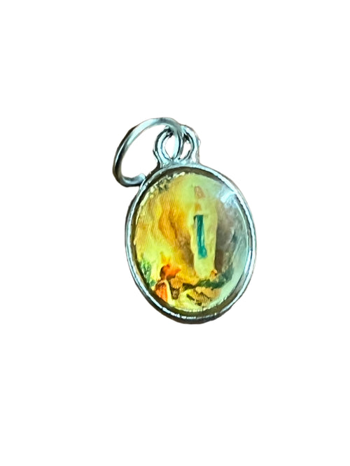 Small oval Our Lady of Lourdes medal charm with silver-tone frame and colorful religious image center