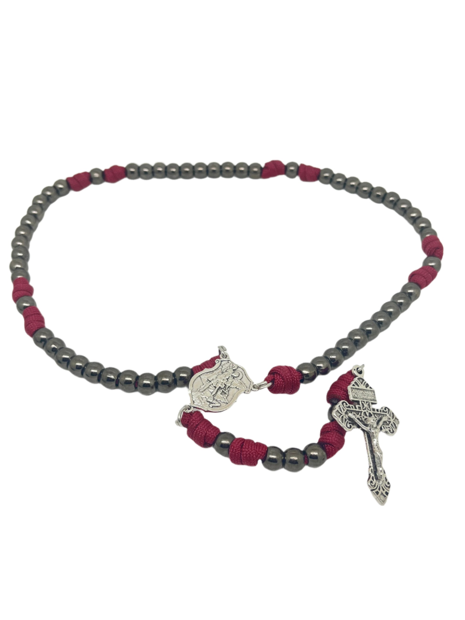 St. Michael paracord spiritual warfare rosary with metallic beads, red knots, detailed shield medal, and crucifix pendant