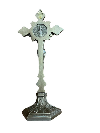 9 3/4" standing bronze crucifix with detailed cold cast finish, ornate base, and St. Benedict medallion on front