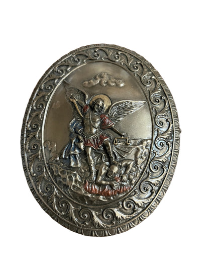 4 3/4" Saint Michael oval bronze keepsake box with detailed raised archangel defeating demon and ornate border design