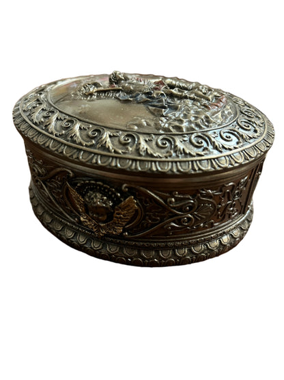 4 3/4" Saint Michael oval keepsake box in bronze-tone with detailed angel and ornate scrollwork design