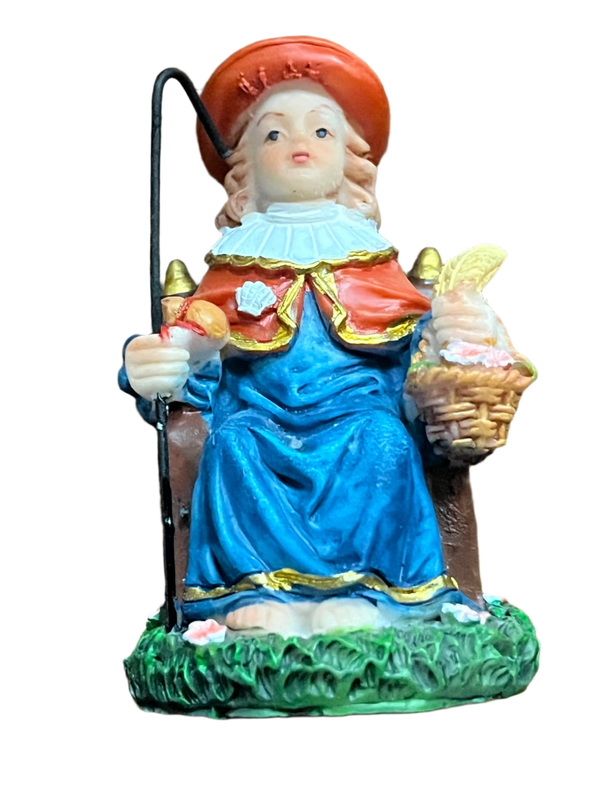 3-inch Santo Niño de Atocha statue featuring Christ Child with staff, basket, and detailed colorful robes on grass base.