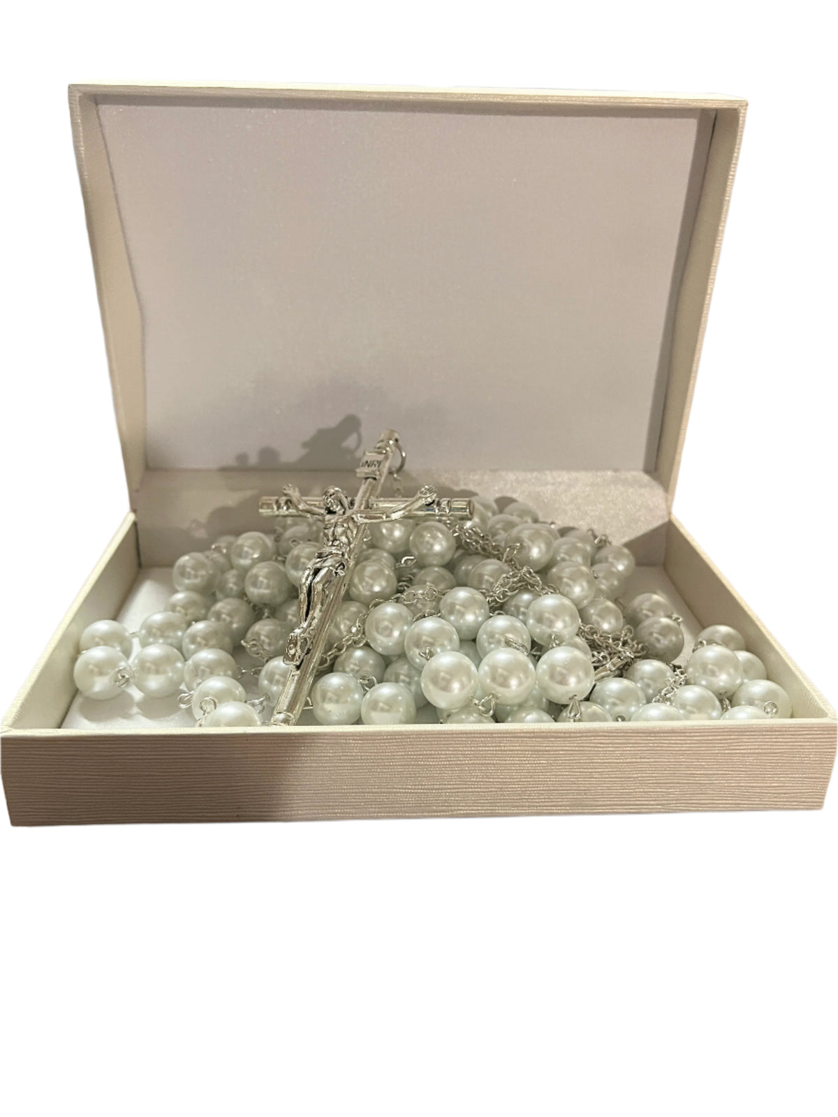 White 12MM faux pearl wedding lasso rosary with silver-tone crucifix displayed in an open beige gift box