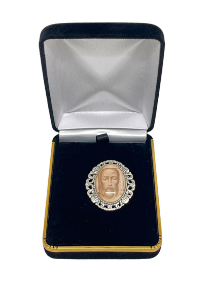 1 1/2" Spanish Holy Face brooch with carved face and ornate silver frame in black velvet display box