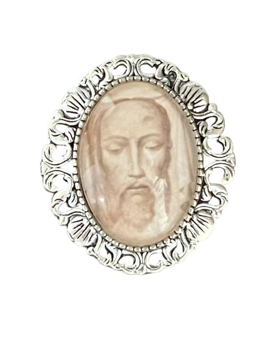 1 1/2" Spanish Holy Face brooch with detailed silver-tone filigree frame and crystal-covered religious image