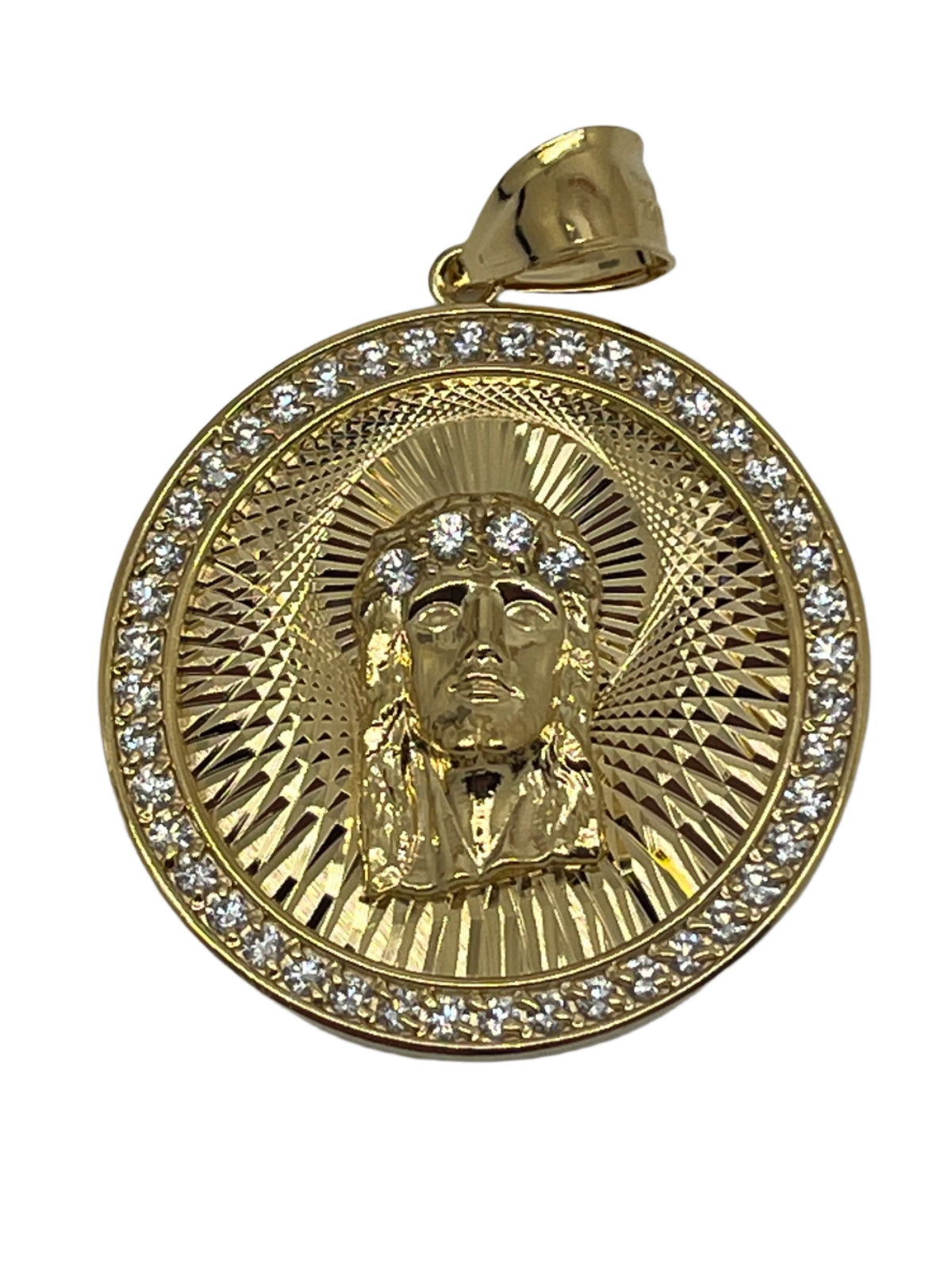 1 3/8" gold plated brass pendant with Holy Face of Jesus, swiss cut detailing, and crystal accents around edge