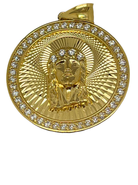 1 3/8" gold plated brass pendant featuring Holy Face of Jesus with sparkling crystal border detailing