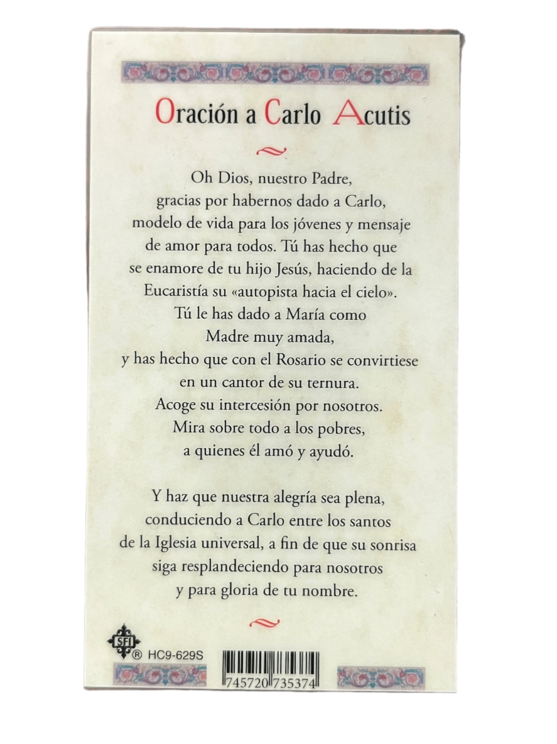 Back of laminated Santo Carlo Acutis prayer card with Spanish text and decorative floral border