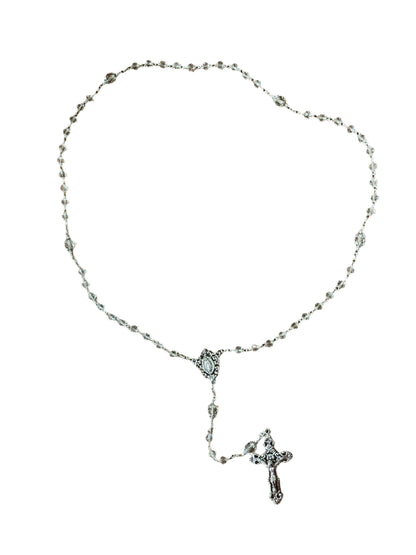 Clear crystal Our Lady of Grace rosary with silver caps, 6mm and 8mm beads, featuring detailed cross and centerpiece