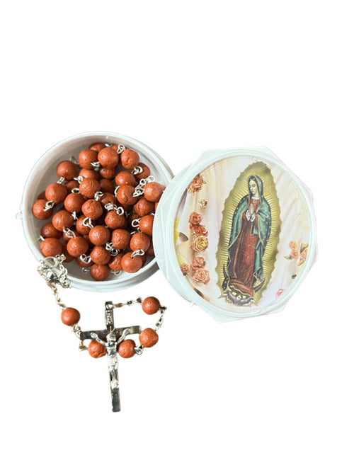 Round white box with Our Lady of Guadalupe image holding a rosary made of real rose petals and silver crucifix inside