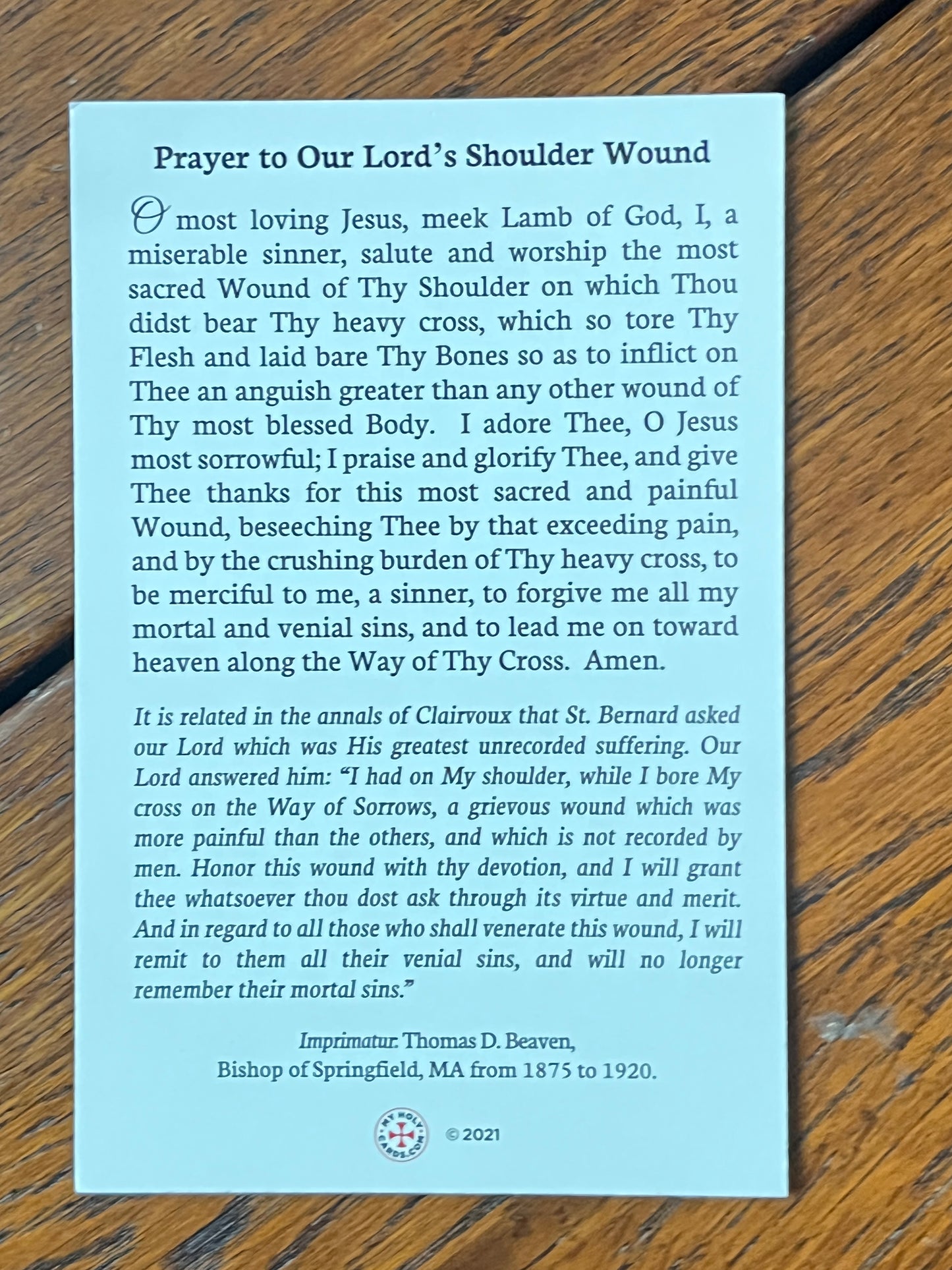 Our Lord's Shoulder Wound Holy Card with prayer text and imprimatur from Bishop Thomas D. Beaven on blue matte cardstock