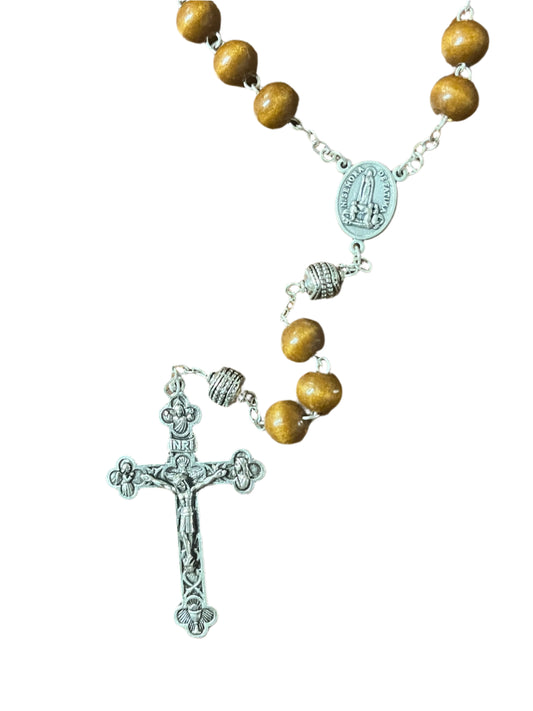 Fatima rosary with 10mm brown wooden beads, silver Our Father beads, Our Lady of Fatima centerpiece, and detailed crucifix