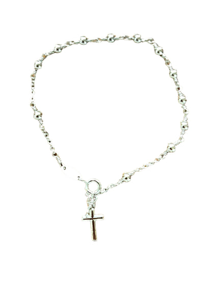 Rhodium plated brass rosary bracelet with small beads and cross charm on white background