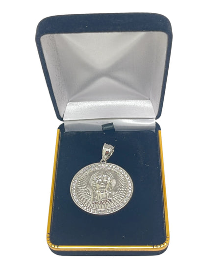 1 3/8" rhodium plated brass pendant featuring detailed Holy Face of Jesus in decorative black velvet gift box