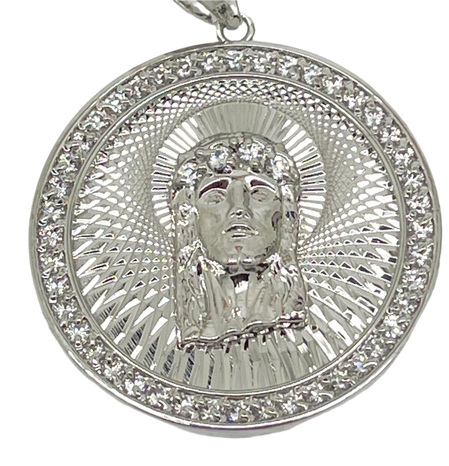 1 3/8" rhodium plated brass pendant featuring the Holy Face of Jesus with detailed pitted and swiss cut design