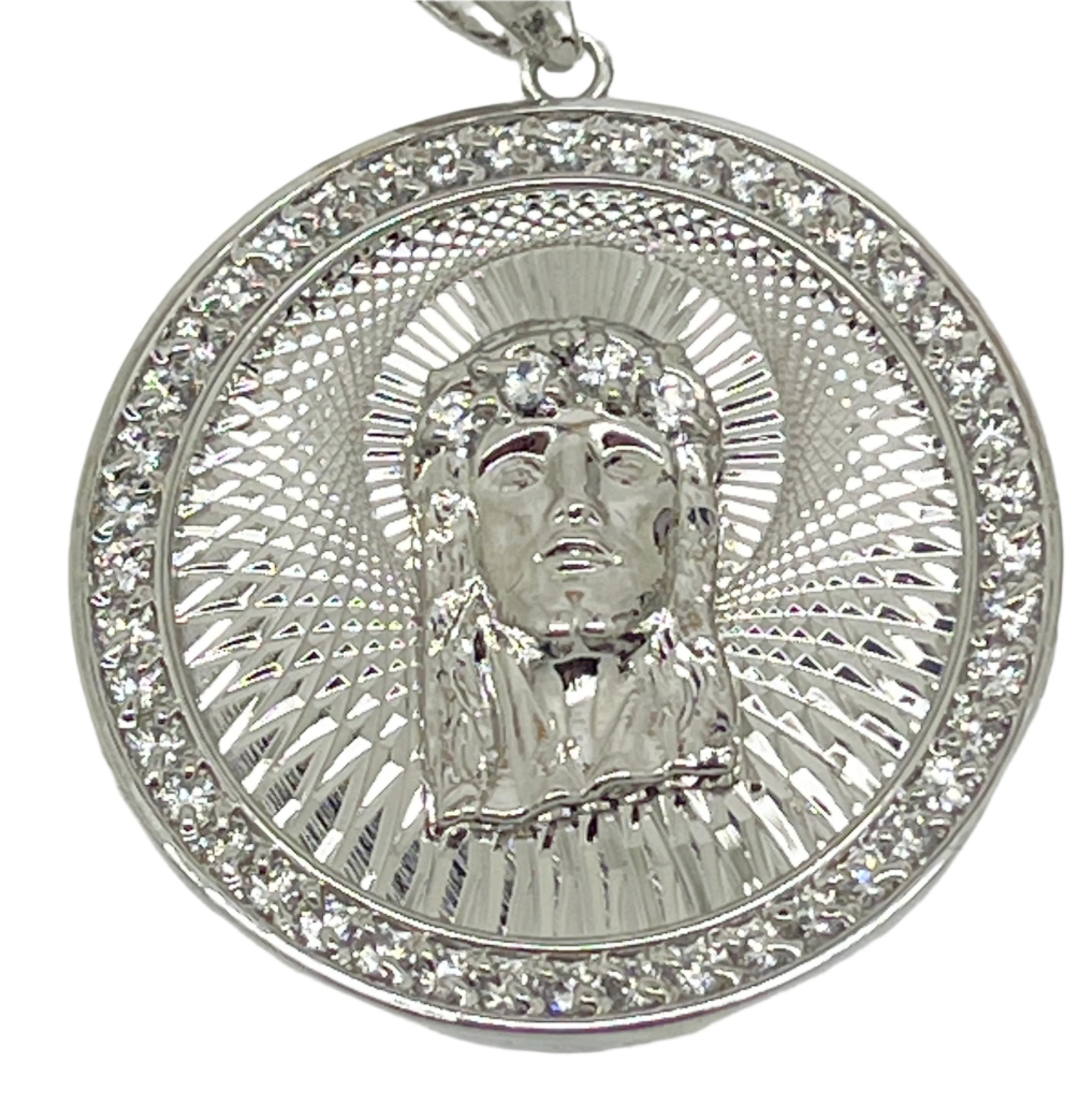 1 3/8" rhodium plated brass pendant featuring the Holy Face of Jesus with detailed pitted and swiss cut design