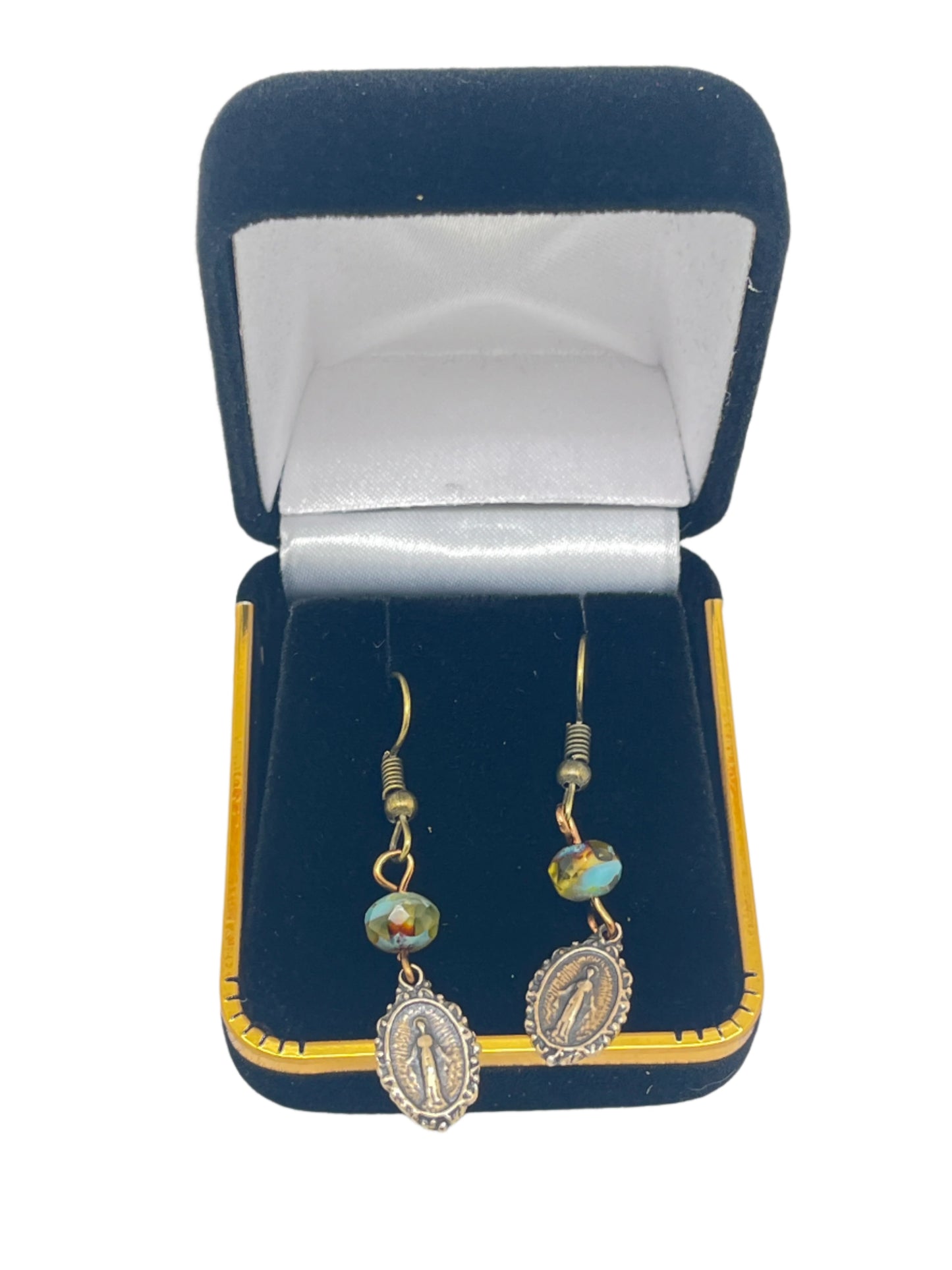 Brass Miraculous Medal earrings with turquoise Czech pearls displayed in black velvet gift box with gold trim