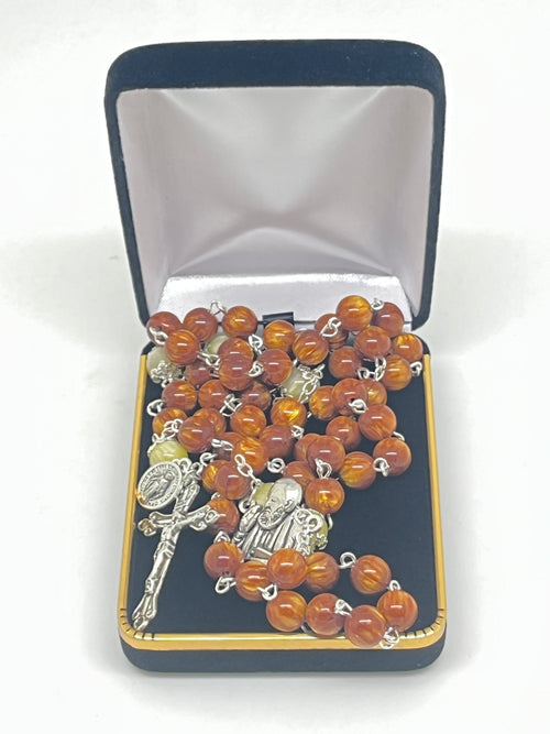 Canticle of the Sun Padre Pio Miraculous Rosary with amber beads and detailed silver crucifix in black velvet box
