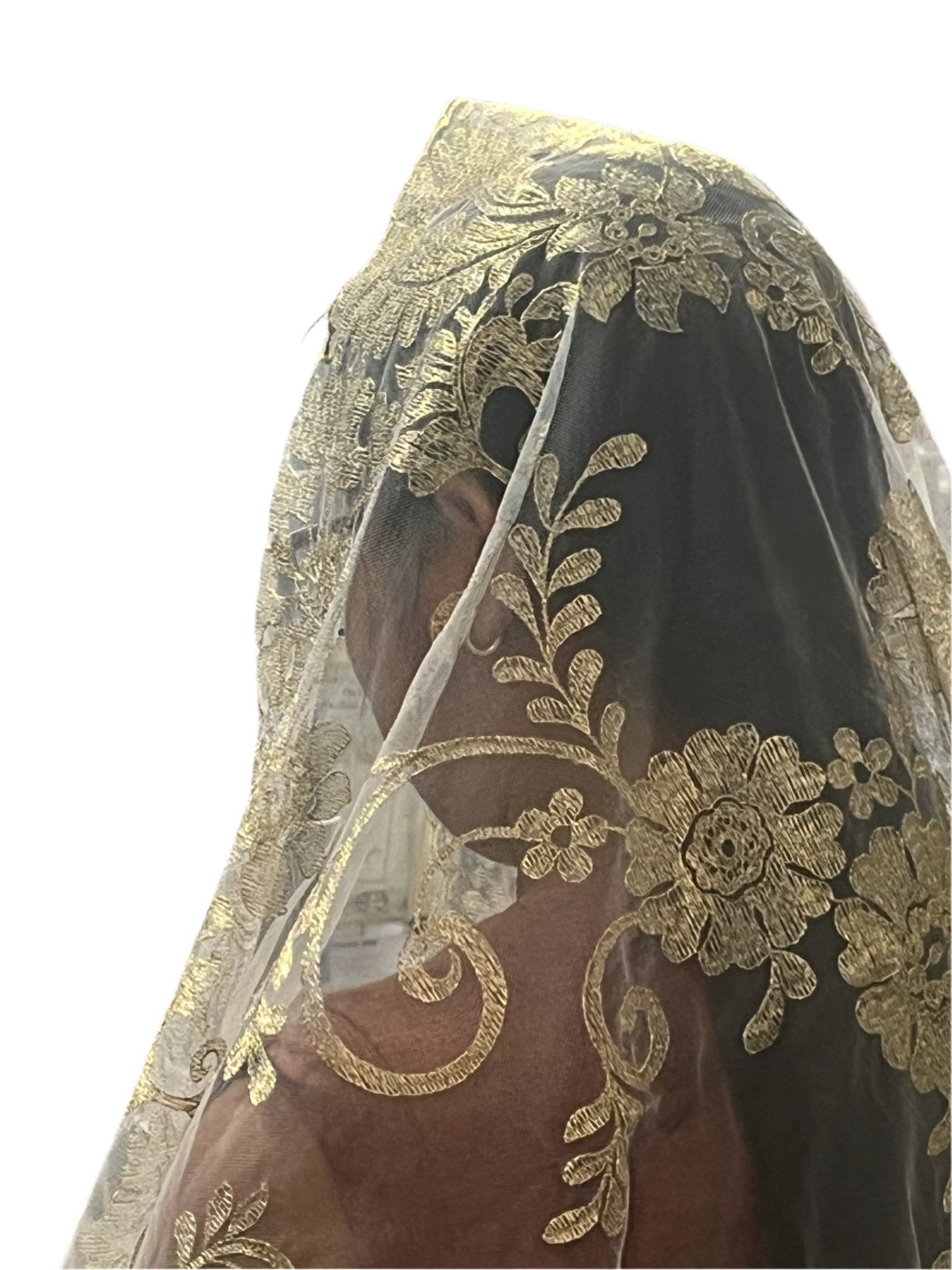 61" Spanish gold floral lace mantilla veil with intricate scalloped edges, worn as a chapel veil for devotion and respect